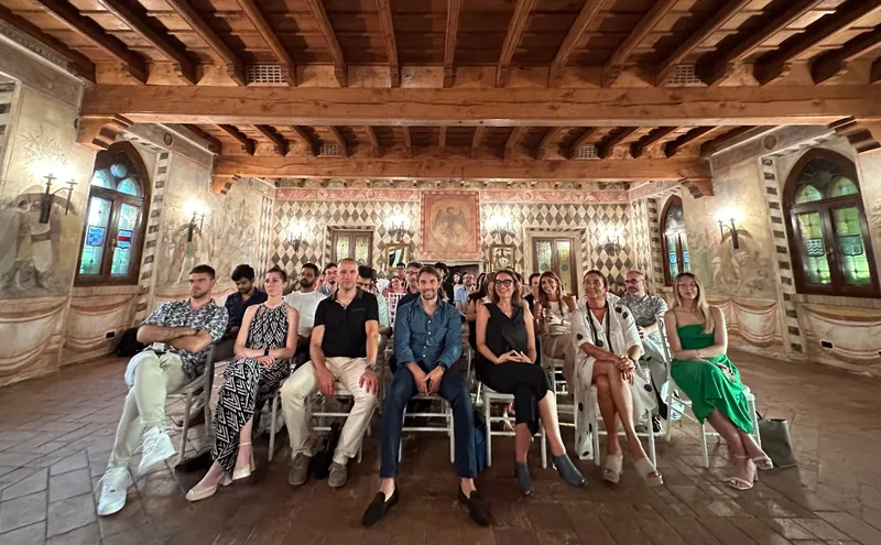FBK team gathering in frescoed hall
